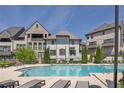Community pool with lounge chairs providing a relaxing experience for residents at 6739 Encore Blvd, Atlanta, GA 30328