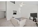 Spacious living room with plush carpet and lots of natural light at 6450 Wellington Chase Ct, Lithonia, GA 30058