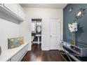 Stylish hallway with a bench seat, elegant console table, and decorative mirrors at 144 Still Pine Bnd, Smyrna, GA 30082