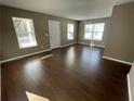 Spacious living room featuring hardwood floors and natural light at 2938 Palm Dr, Atlanta, GA 30344