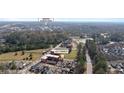 Aerial view showing the property's location relative to Downtown Covington Square at 4121 N Swann St, Covington, GA 30014