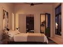 Serene bedroom featuring a comfortable bed, modern decor, and city skyline view at 567 Ponce De Leon Ne Ave # 501, Atlanta, GA 30308