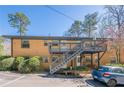 Rear exterior view featuring a private deck and outdoor space, perfect for relaxing at 1010 Scott Blvd # D8, Decatur, GA 30030
