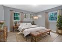 Charming bedroom with ample natural light, wood floors, and neutral color scheme at 1513 Spruce Ridge Way, Stone Mountain, GA 30083
