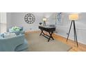 Cozy study featuring elegant decor, hardwood floors, and natural light at 3655 Autumn Ridge Pkwy, Marietta, GA 30066