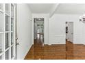 Bright foyer with hardwood floors and white trim at 3277 Wyesham Cir, Duluth, GA 30096