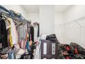 Spacious walk-in closet featuring shelving and space for storage, providing ample room for organization at 939 Brittfield Way, Loganville, GA 30052