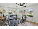 Bright living room with large windows, stylish decor, and comfortable seating, perfect for relaxation at 863 Birch St, Forest Park, GA 30297