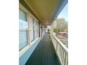 Spacious covered porch showcasing its plank flooring and charming curb appeal at 971 Martin Se St, Atlanta, GA 30315