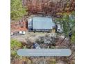 Aerial view of the property's garage, suitable for contractors, mechanics, and creators at 4751 Bill Cheek Rd, Auburn, GA 30011