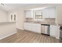 Well-lit kitchen features granite countertops and stainless steel appliances at 3807 Memorial Nw Pkwy, Kennesaw, GA 30152