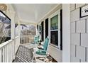 Cozy front porch with rocking chairs perfect for relaxing and enjoying the neighborhood views at 1712 Green Farm Cir, Dacula, GA 30019