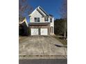 Beautiful two story home with brick and vinyl siding, along with an attached two-car garage at 295 Laurelton Cir, Lawrenceville, GA 30044