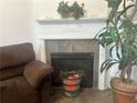Cozy living room featuring a fireplace, perfect for relaxation and peace at 2490 Laurel Nw Cir, Atlanta, GA 30311