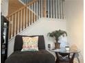Comfortable seating area near stairs with decor and great natural light at 2490 Laurel Nw Cir, Atlanta, GA 30311