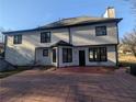 Spacious backyard featuring a large patio, perfect for outdoor entertainment at 3442 Fox Hollow Dr, Marietta, GA 30068