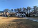Beautiful home with a long driveway and spacious front yard in a quiet neighborhood at 3442 Fox Hollow Dr, Marietta, GA 30068