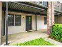 Inviting entrance with a covered porch and well-maintained landscaping at 3087 Colonial Way # J, Atlanta, GA 30341