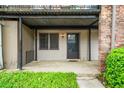 Inviting entrance with a covered porch and well-maintained landscaping at 3087 Colonial Way # J, Atlanta, GA 30341