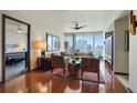 Bright living room features city views, hardwood floors, and modern decor at 3338 Peachtree Ne Rd # 2405, Atlanta, GA 30326