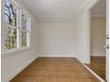 Bright foyer with tiled floors and a view to the adjacent hardwood floor room at 2126 Jernigan Se Dr, Atlanta, GA 30315