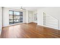 Bright living room with hardwood floors, large windows, and built-in shelving offering modern living at 472 Martin Se St # 1, Atlanta, GA 30312