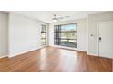 Bright living room with natural light and hardwood floors with large windows at 472 Martin Se St # 1, Atlanta, GA 30312