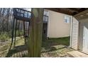 Exterior view of back deck with stairs at 7128 Crystal Creek Pl, Douglasville, GA 30134