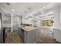 Modern kitchen with granite countertops, stainless steel appliances, and hardwood floors at 372 Mulberry Se Row, Atlanta, GA 30354