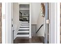 Inviting home foyer featuring hardwood floors, stairs, and neutral decor at , Duluth, GA 30096