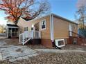 Cozy single story home featuring a screened in porch, brick stairs, and rear door at 488 Mcwilliams Se Ave, Atlanta, GA 30316