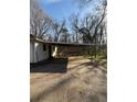 View of a carport showing seating at 1027 N Born Rd, Stone Mountain, GA 30088