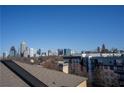 Amazing skyline view of Atlanta from the rooftop showing tall buildings and a clear blue sky at 401 16Th Nw St # 1463, Atlanta, GA 30363