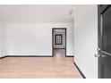 Bright and spacious living room featuring new flooring and painted trim at 1463 Rockmoor Ct, Stone Mountain, GA 30088