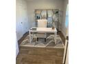 Well-lit home office offers a desk, chair, modern shelving, and calming decor at 740 Great Oak Pl, Villa Rica, GA 30180
