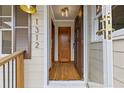 Inviting entryway with gleaming hardwood floors and natural light at 1312 Milstead Ave, Conyers, GA 30012