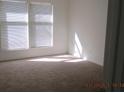 Bright bedroom with large windows and neutral carpet at 4263 Parkview Ct, Stone Mountain, GA 30083