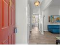 Inviting entryway with light gray walls, beautiful flooring, and open access to living spaces at 1312 Brandl Sw Dr, Marietta, GA 30008