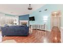 Spacious living room with vaulted ceiling, fireplace, and beautiful natural lighting at 775 Freeman Dr, Covington, GA 30016