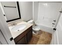 Cozy bathroom featuring a vanity, toilet, and shower/tub combo at 2897 Austin Common Dr, Dacula, GA 30019