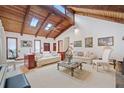Bright living room features vaulted wood ceilings, a cozy fireplace, and neutral decor at 3278 Winter Wood Ct, Marietta, GA 30062