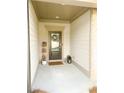 Inviting covered front porch with stylish decor and a cozy ambiance at 5745 Pickens Garden Ln, Powder Springs, GA 30127
