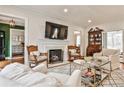 Cozy living room features a fireplace, hardwood floors, and elegant decor, perfect for relaxation at 2885 Alpine Ne Rd, Atlanta, GA 30305