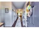 Entryway featuring wood-look floors, gray walls, and a decorative wreath on the door at 1709 Creel Ln, Atlanta, GA 30349