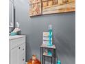 Stylish powder room featuring modern fixtures, decor, and a decorative tile accent at 6028 Providence Dr, Union City, GA 30291