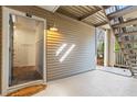 Inviting doorway with welcome mat and brick flooring offers a warm entrance to this charming home at 706 Barrington Hills Dr, Atlanta, GA 30350