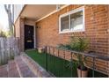 Welcoming front entrance with brick steps, railing, and a green turf mat adding a touch of warmth and style at 2516 Bradford Ne Sq, Atlanta, GA 30345