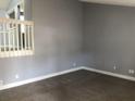 This is a living room with gray walls and stairs at 6831 Lismore Dr, Norcross, GA 30093