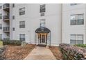 Apartment building entrance with covered walkway and detailed trim at 970 Sidney Marcus Blvd # 1217, Atlanta, GA 30324