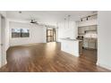 Open-concept room featuring modern fixtures, hardwood flooring, and natural light at 2230 Cheshire Bridge Ne Rd # 410, Atlanta, GA 30324